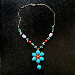 Beautiful blue turquoise and coral colored artisan chic floral necklace.